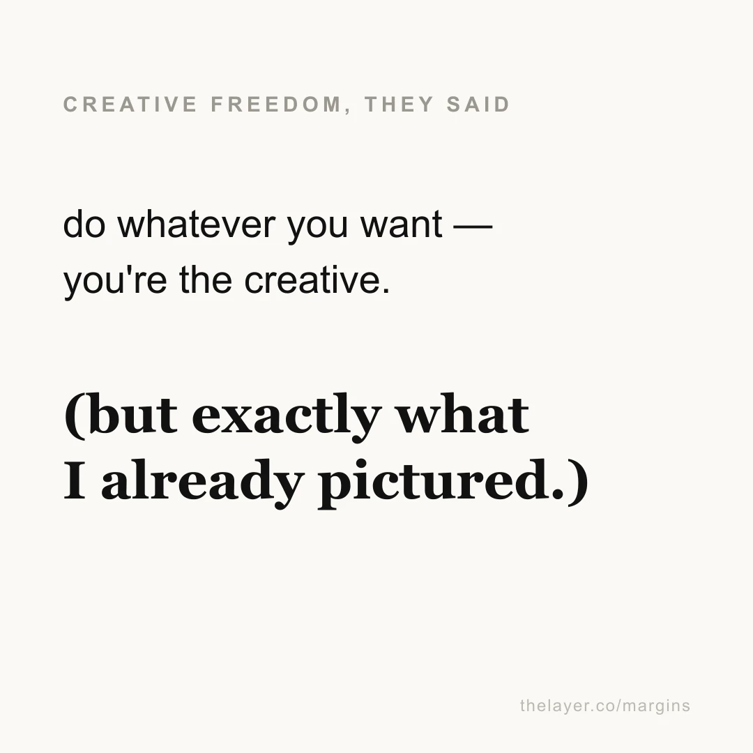 Text reading 'do whatever you want — you're the creative.' followed by the large parenthetical 'but exactly what I already pictured.' under the label 'creative freedom, they said.'